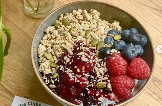 Granola bowl with yogurt, berries and seeds