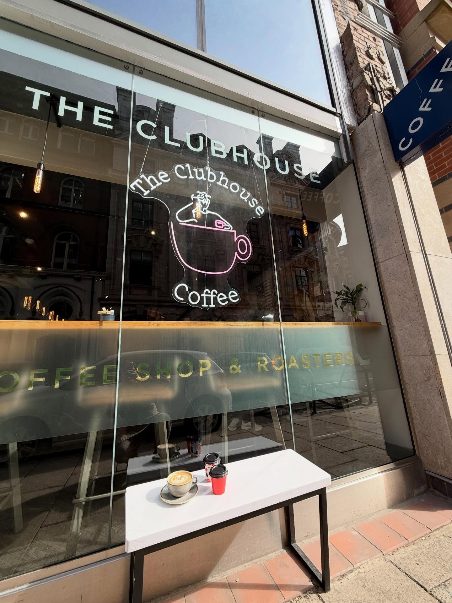 The Clubhouse Coffee storefront with neon sign in Leeds